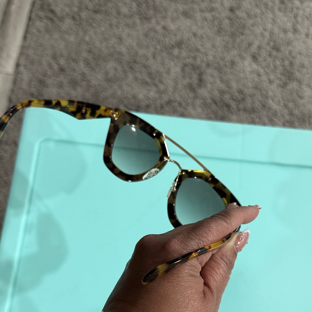 Prada Black Tortoiseshell Cat-Eye Sunglasses with Gold Accents - Picture 4 of 4